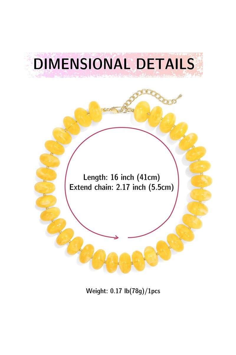 Yellow beaded necklace with dimensions and weight information on a white background